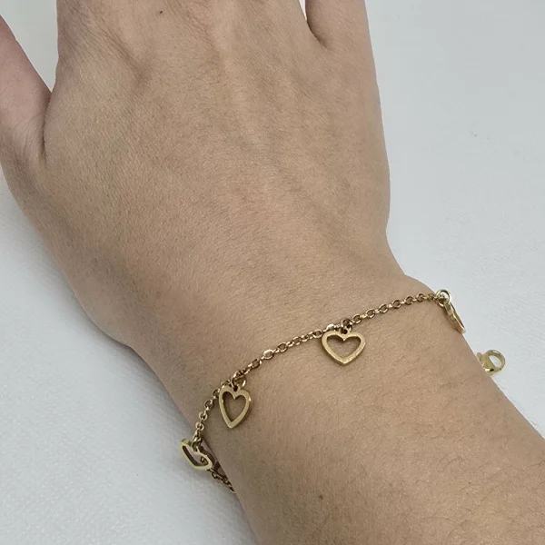 PULSERA CON DIJES CORAZÓN SIN RELLENO (ACERO DORADO)