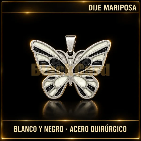 DIJE MARIPOSA ESMALTADA BLANCO Y NEGRO (A.Q.) — vista principal sobre fondo negro con detalles dorados